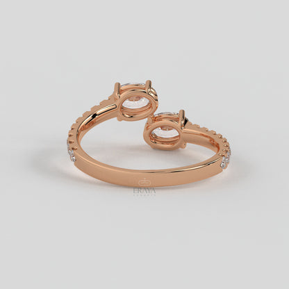 Rose gold bracelet with a subtle design on a light gray background