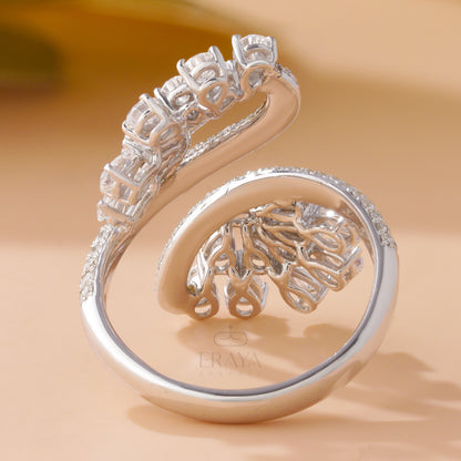 Pear cut diamond cocktail ring with pavé band