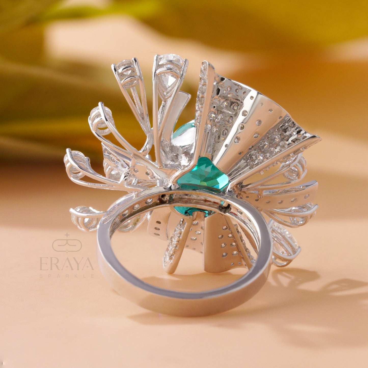 Paraiba stone cocktail ring with mixed diamond accents