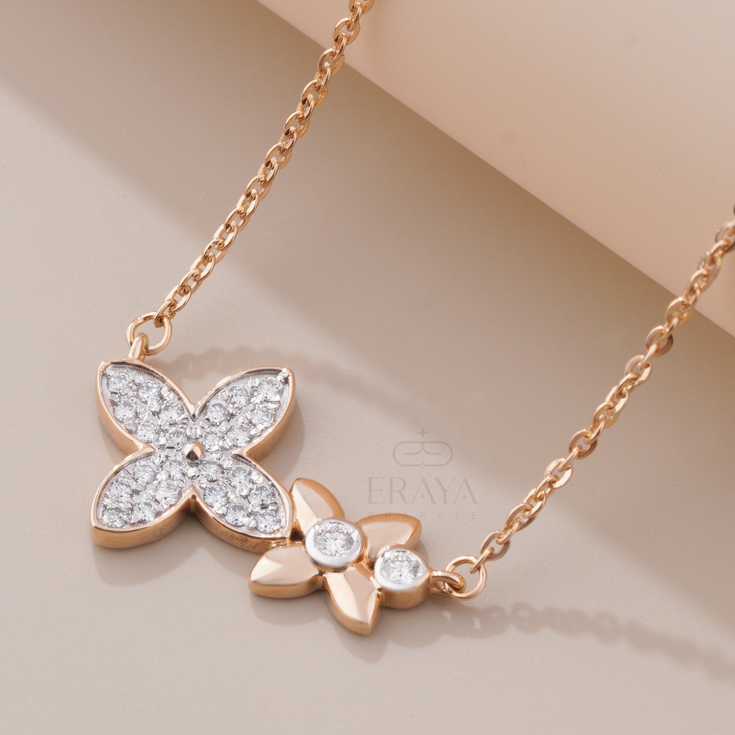 Close-up of round diamond pendant with bezel and pavé-set stones