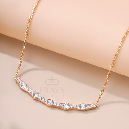 Close-up of curved bar pendant featuring 21 round diamonds – lab grown diamond necklace