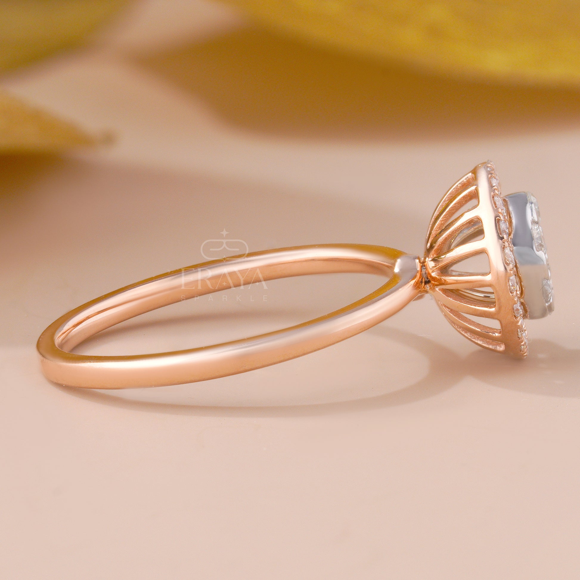 Yellow gold floral cluster ring — close-up of halo setting