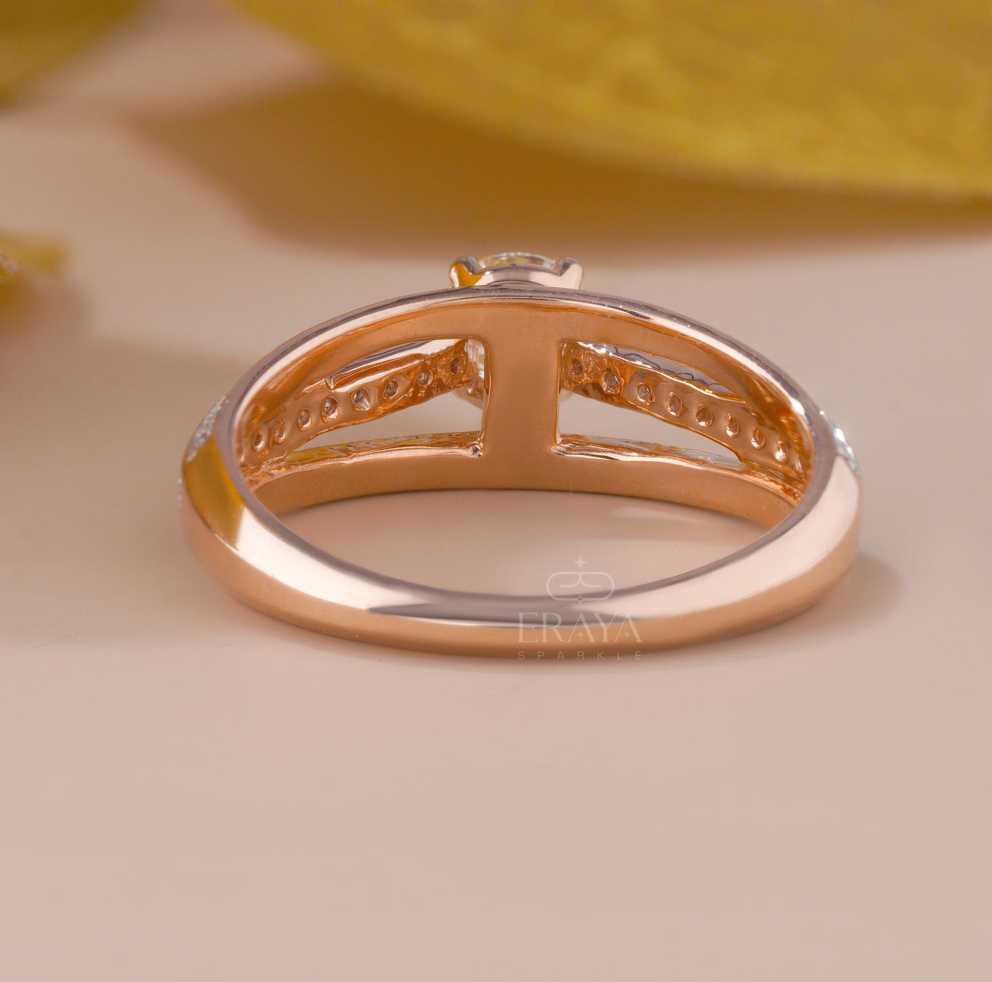 Ethical rose gold engagement ring with pavé accent diamonds