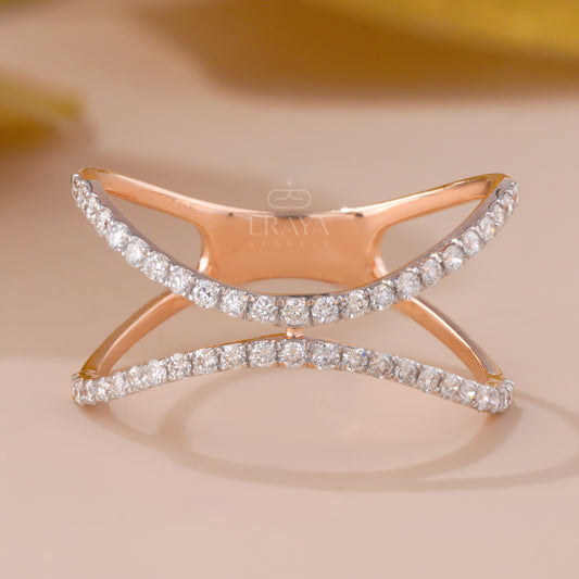 Rose gold ring with diamonds on a beige background