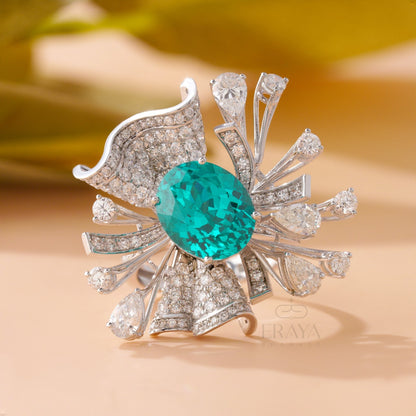 Oval Paraiba color stone ring with lab-grown diamond halo