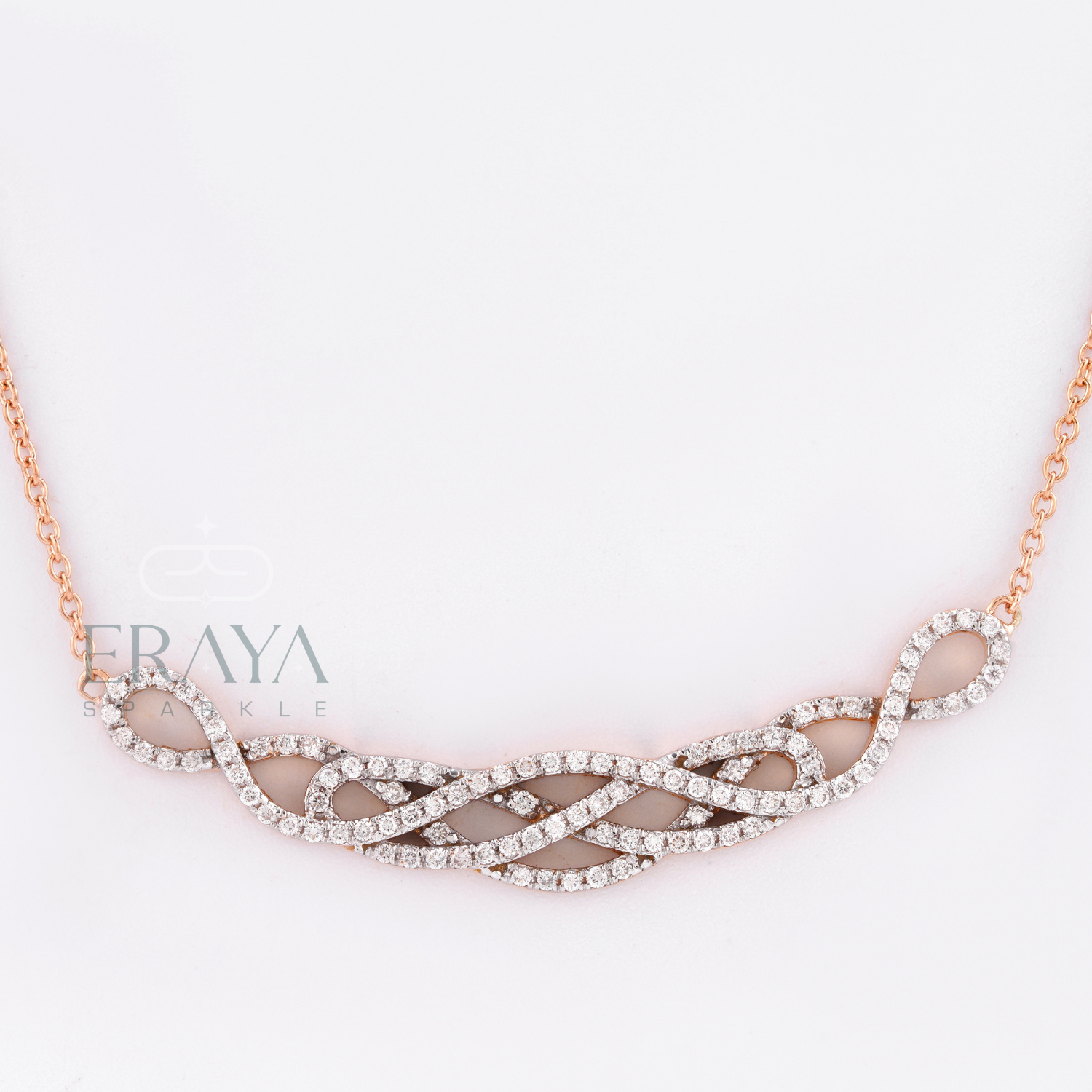 Close-up of infinity knot pendant showing handset round lab-grown diamonds - IGI GIA certified