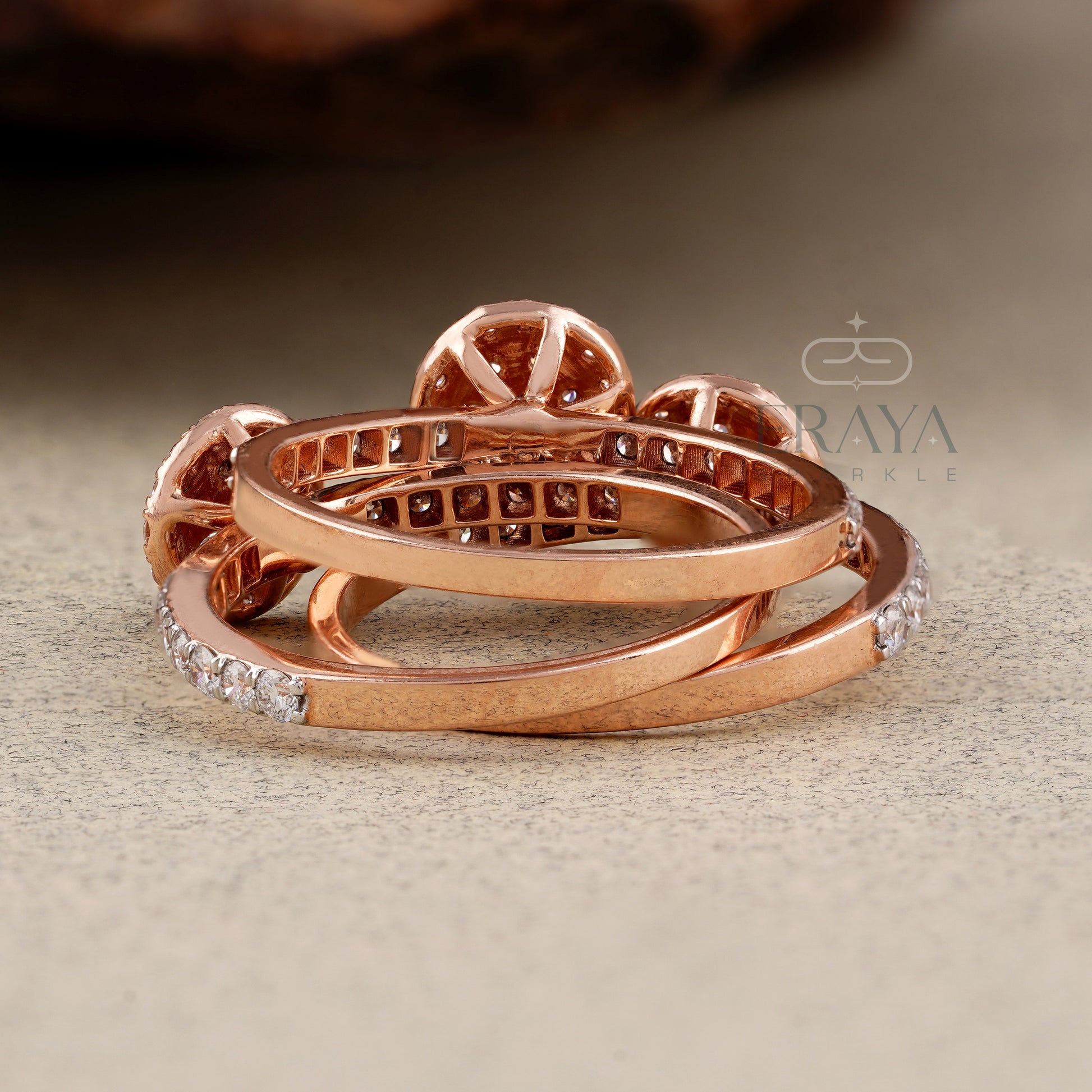Rose gold ring with Labgrown  diamond accents on a textured surface, featuring the ERAYA brand.