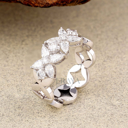 Silver ring with diamond-like stones 