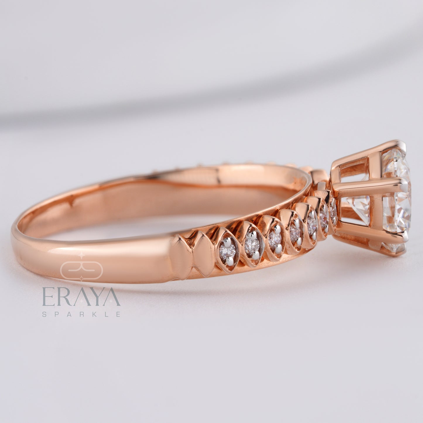 Custom solitaire engagement ring with side diamonds