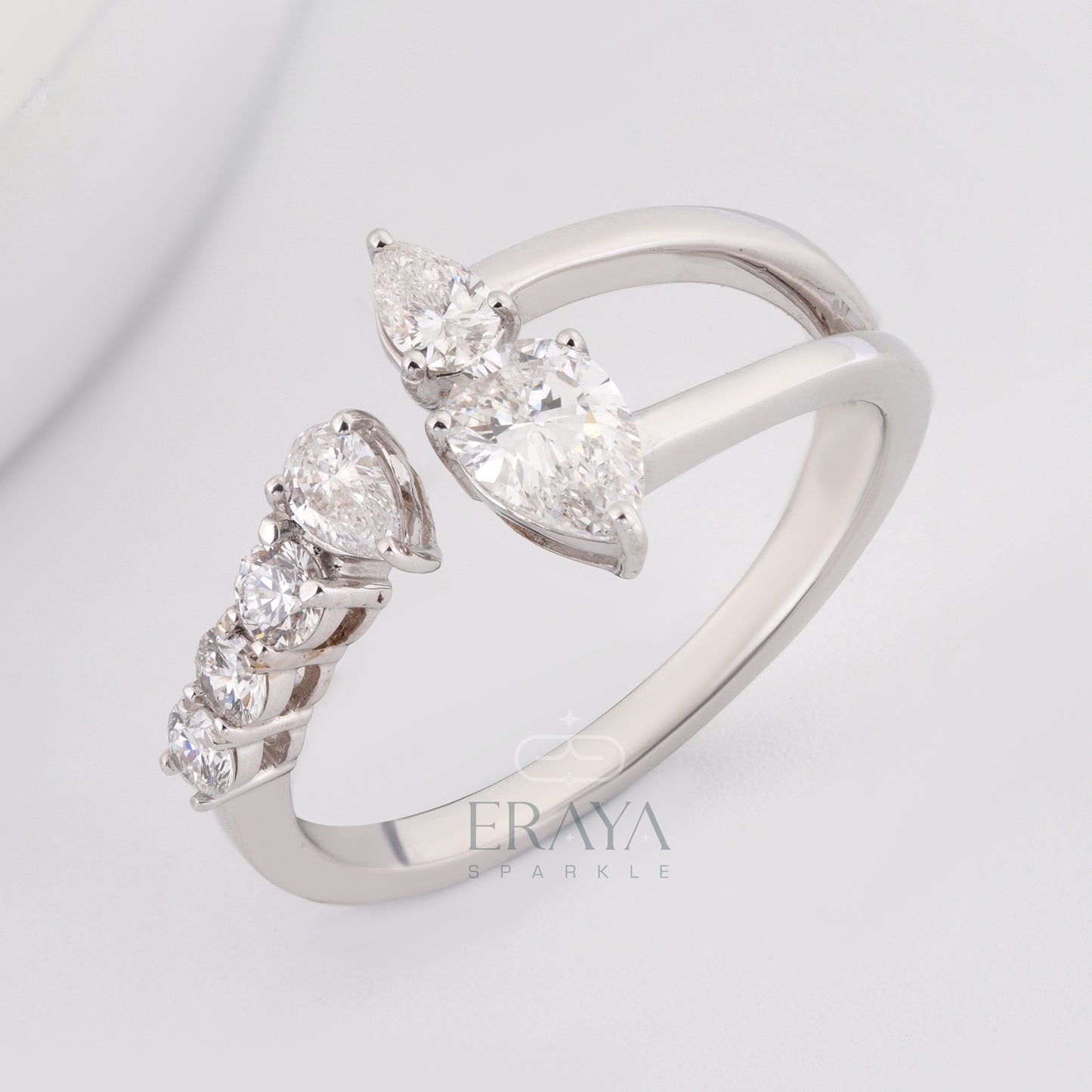 Pear cut lab grown diamond open band engagement ring