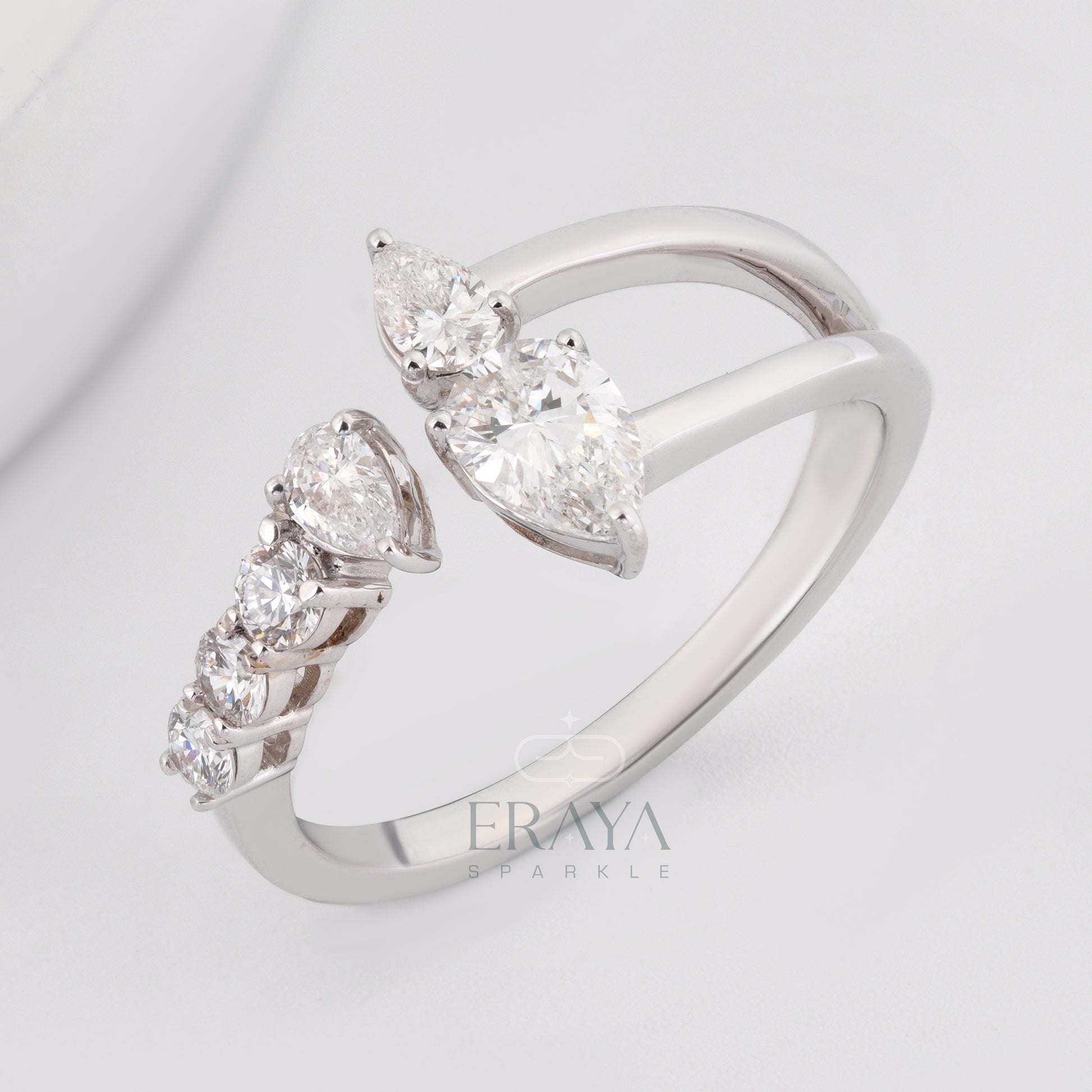 Pear cut lab grown diamond open band engagement ring