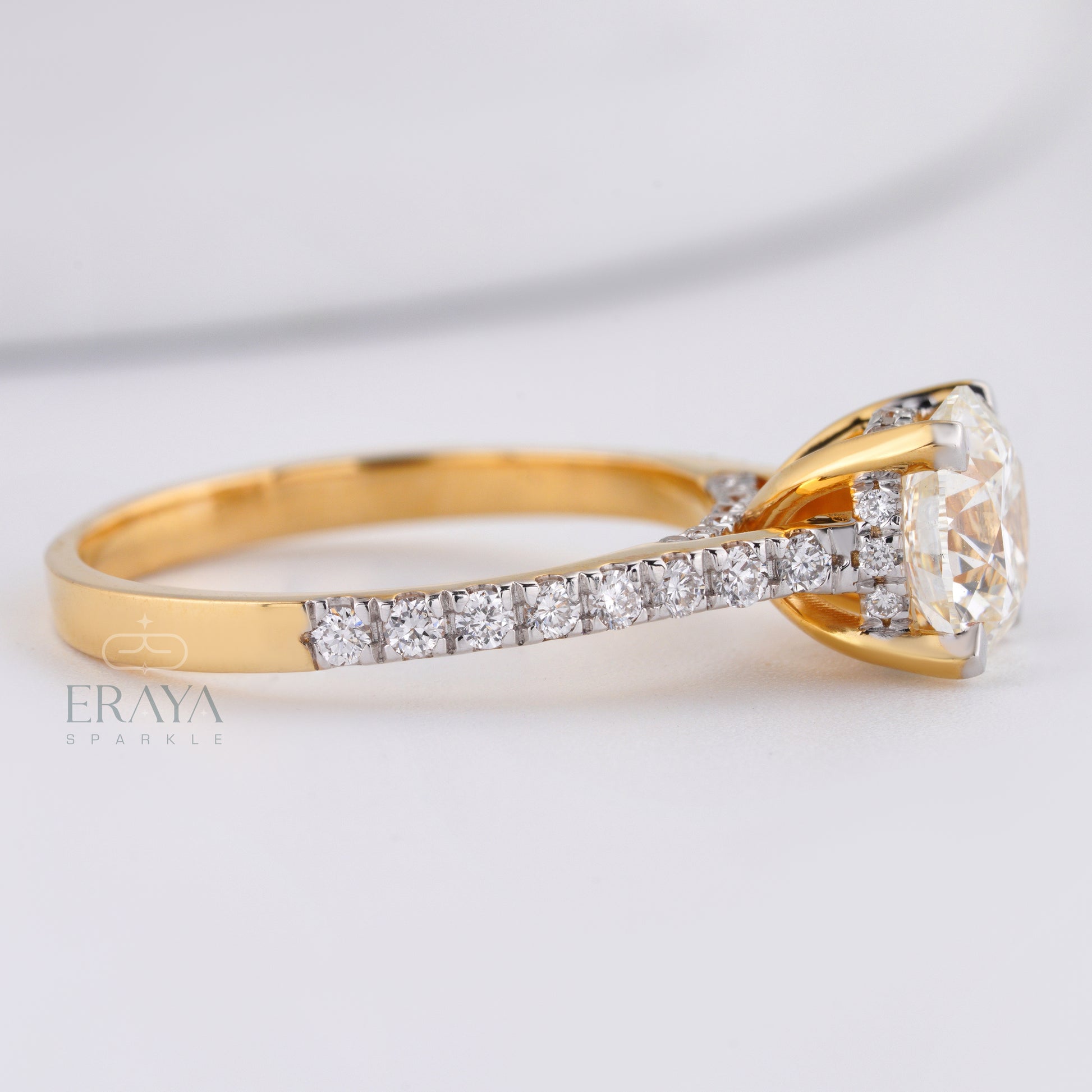 Round brilliant lab-grown diamond ring with side stones