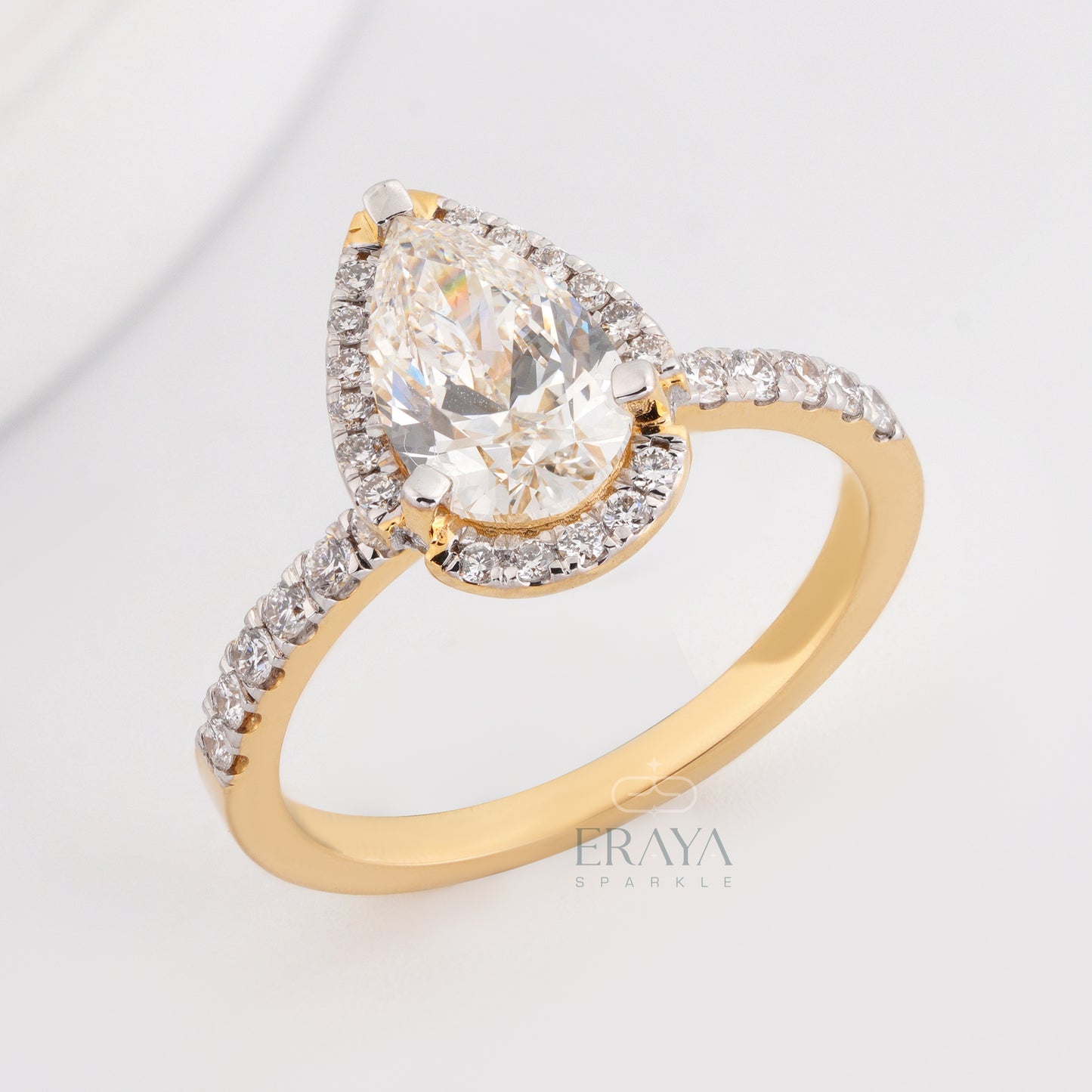 10x6mm pear cut lab-grown diamond halo engagement ring in rose gold