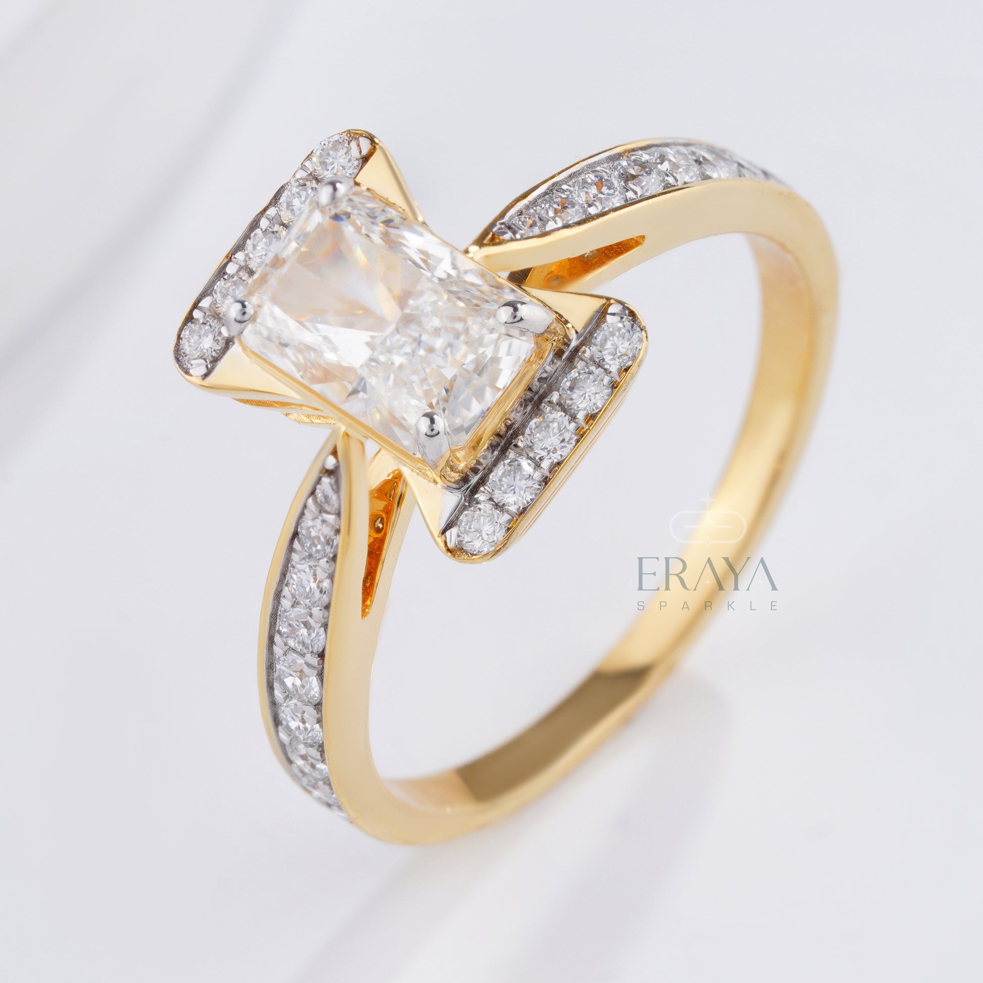 8x5.5mm radiant cut lab-grown diamond crossover pavé ring in yellow gold