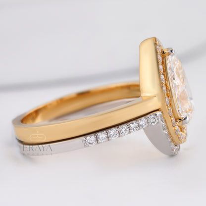 Close-up of pear cut halo ring featuring ethical lab-grown diamonds