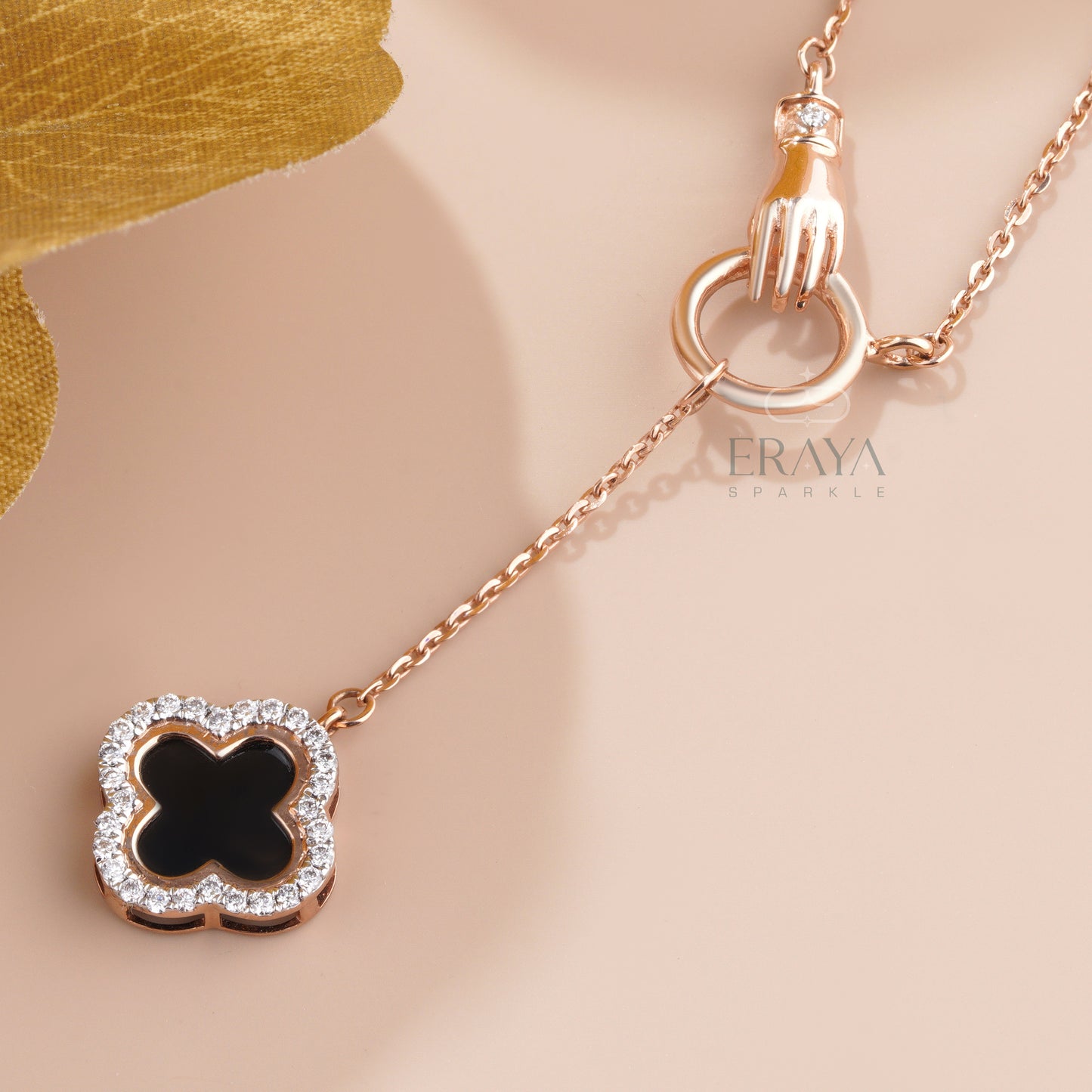 Close-up of black enamel four-leaf clover outlined with lab-grown diamonds - IGI GIA certified lab grown diamonds necklace