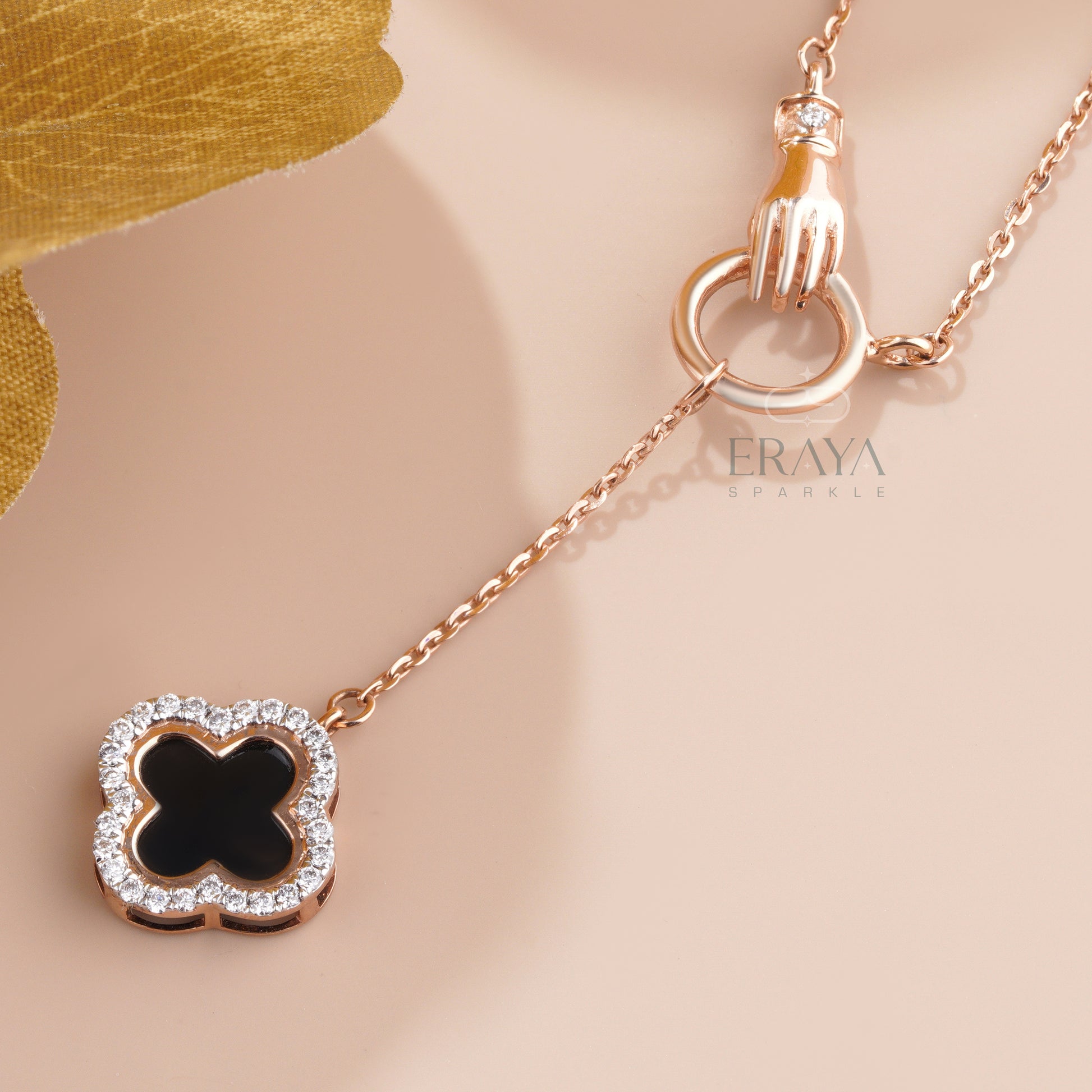 Close-up of black enamel four-leaf clover outlined with lab-grown diamonds - IGI GIA certified lab grown diamonds necklace