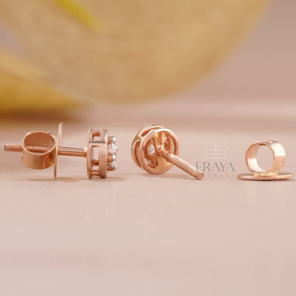 classic-round-diamond-stud-earrings-on-ear