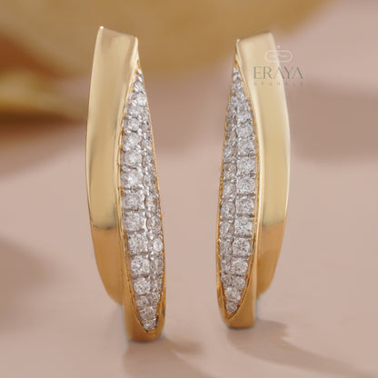 modern-curved-diamond-earrings-on-ear