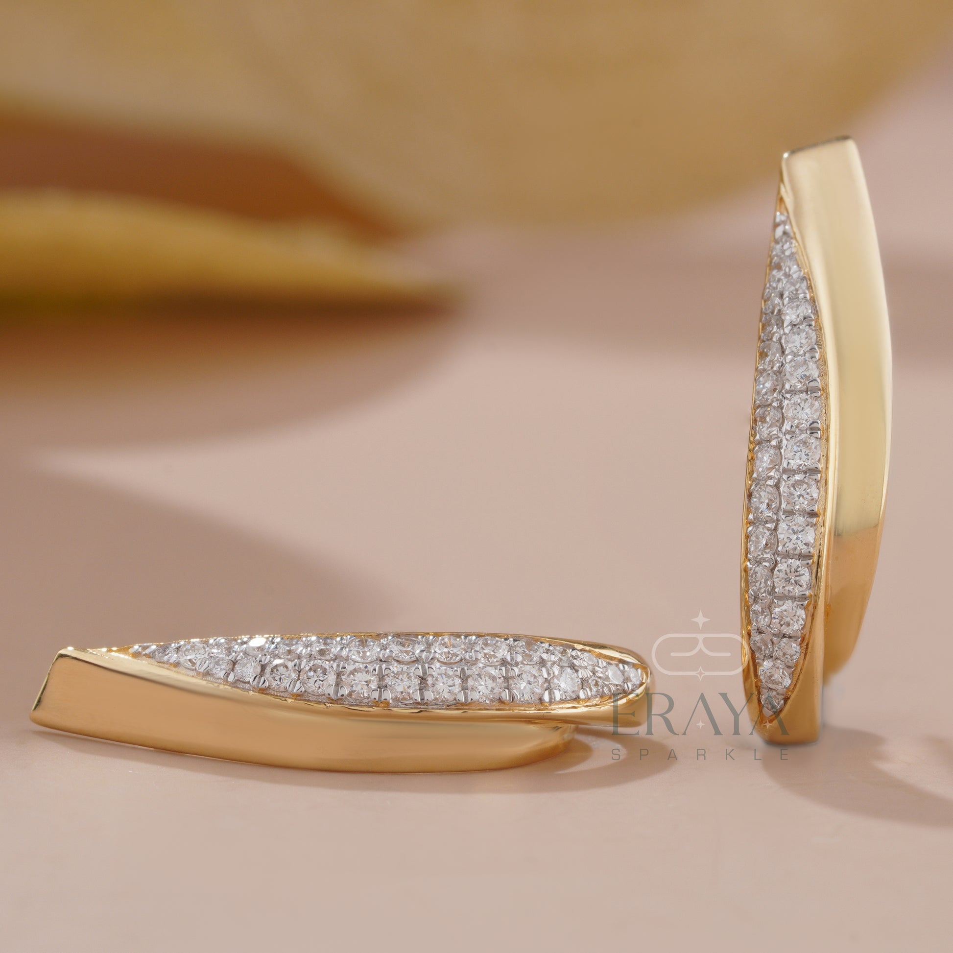 curved-diamond-earrings-side-top-view