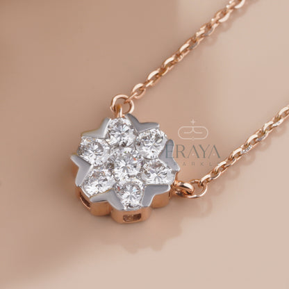 Side profile of snowflake cluster pendant showing diamond setting and chain
