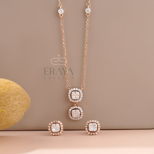 Front angle of round diamond halo pendant with matching halo stud earrings