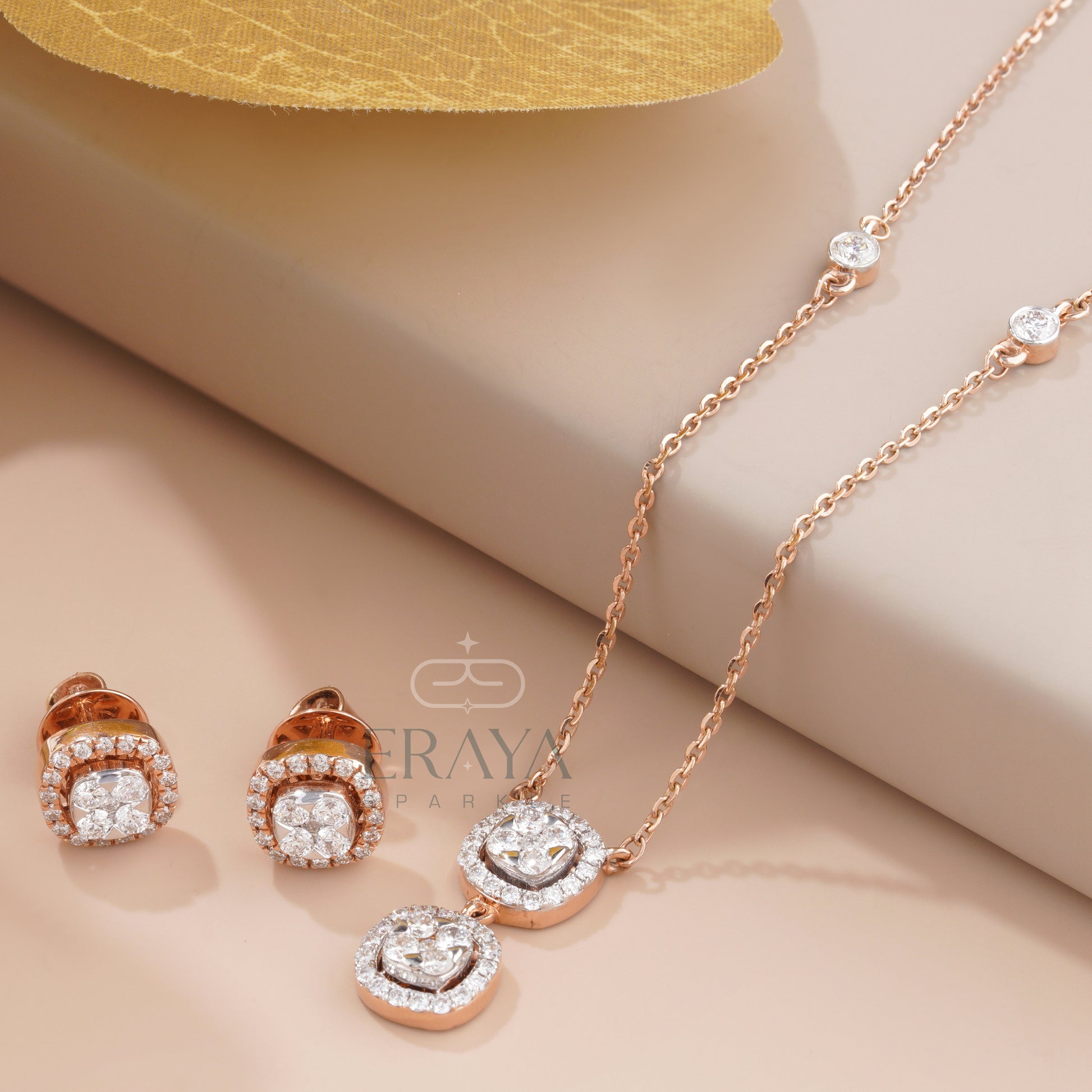 Round diamond cluster pendant and earrings set with halo design – complete product view