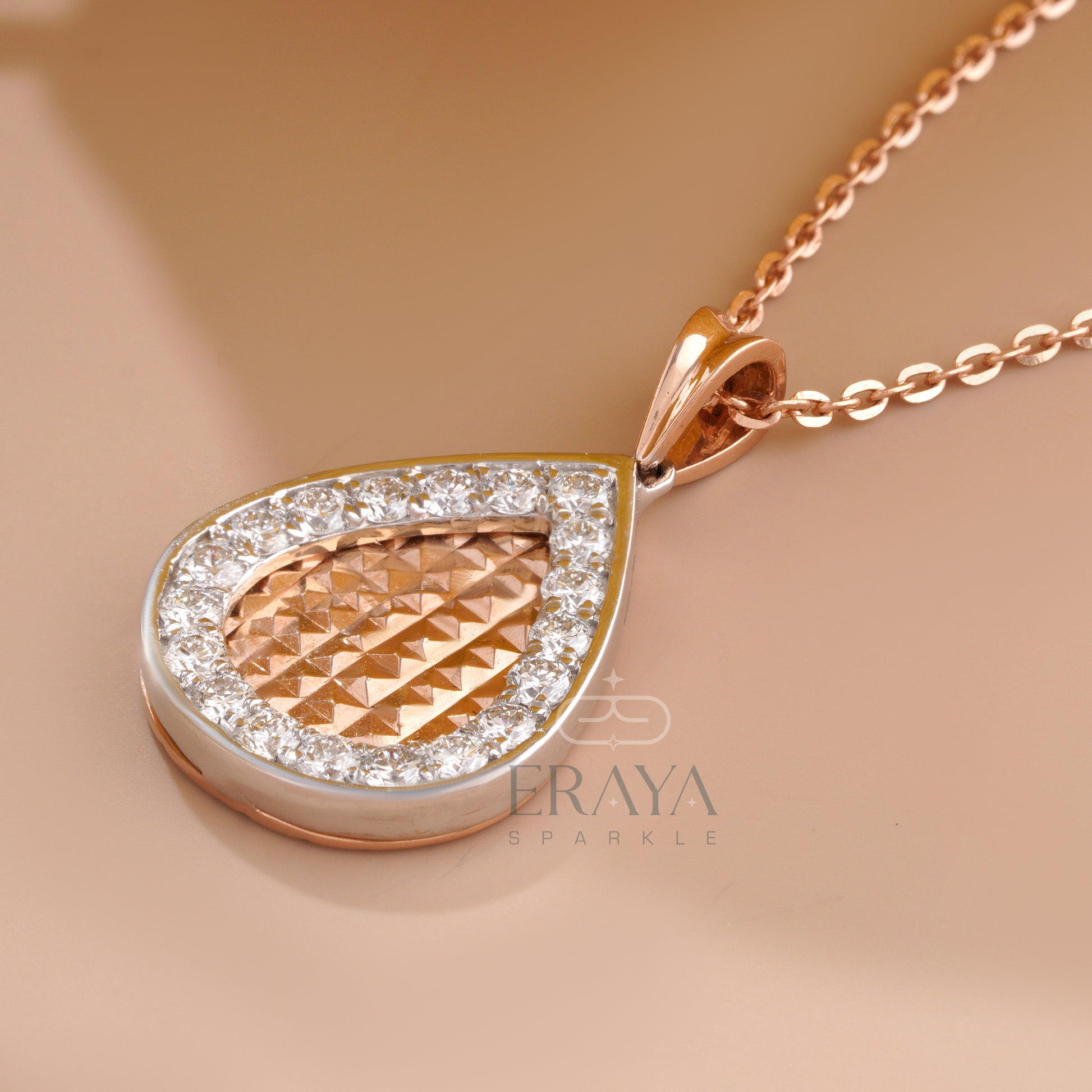 Rose gold teardrop diamond pendant with halo design – close front view