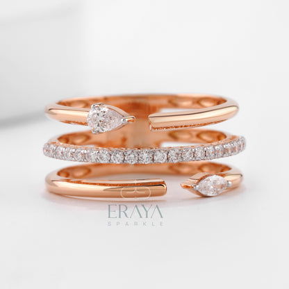 Rose gold open band ring with pear and marquise lab-grown diamonds — front view
