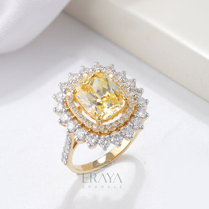 Cushion cut yellow center stone double halo ring in white gold