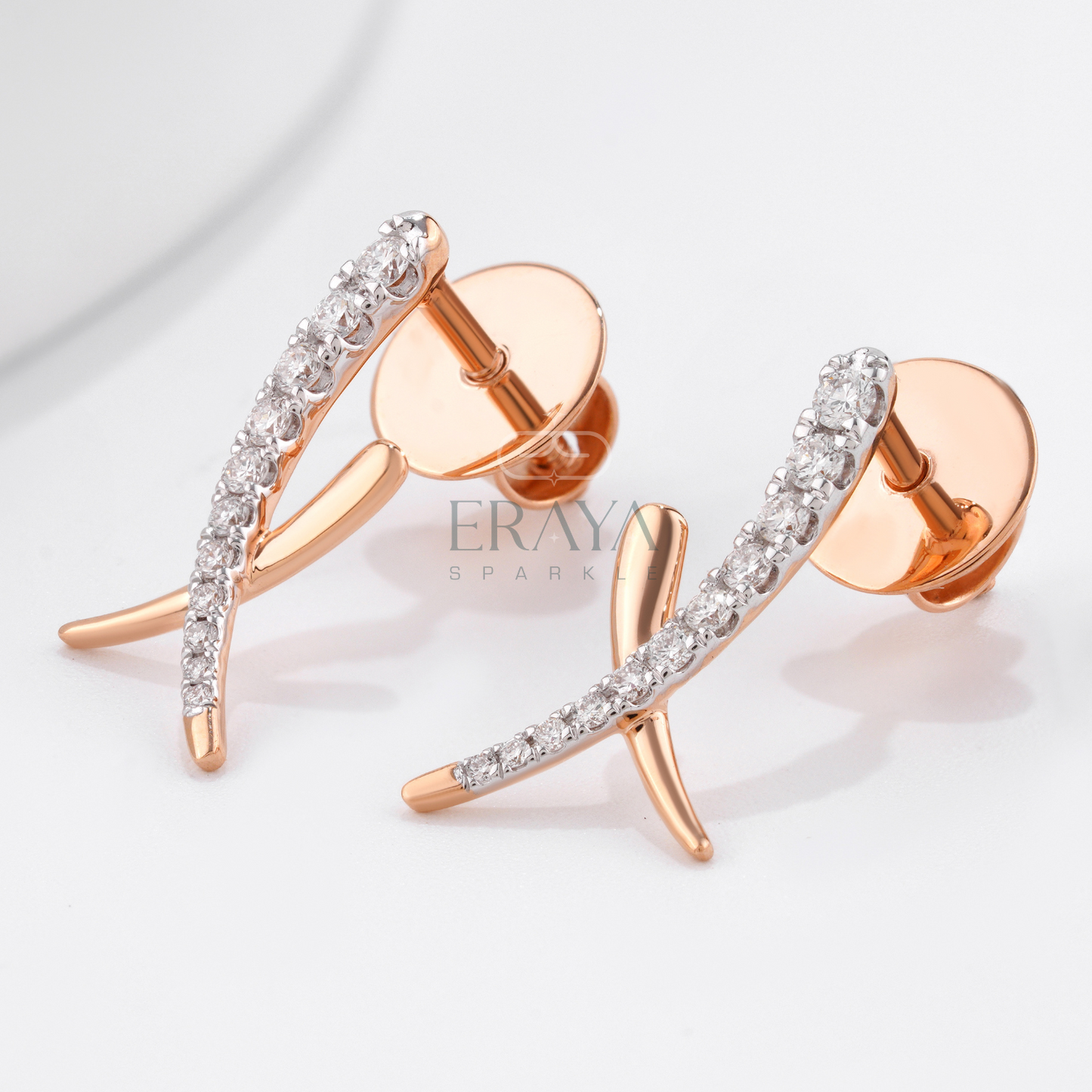 minimalist-rose-gold-twist-earrings-close-up-diamond-detail