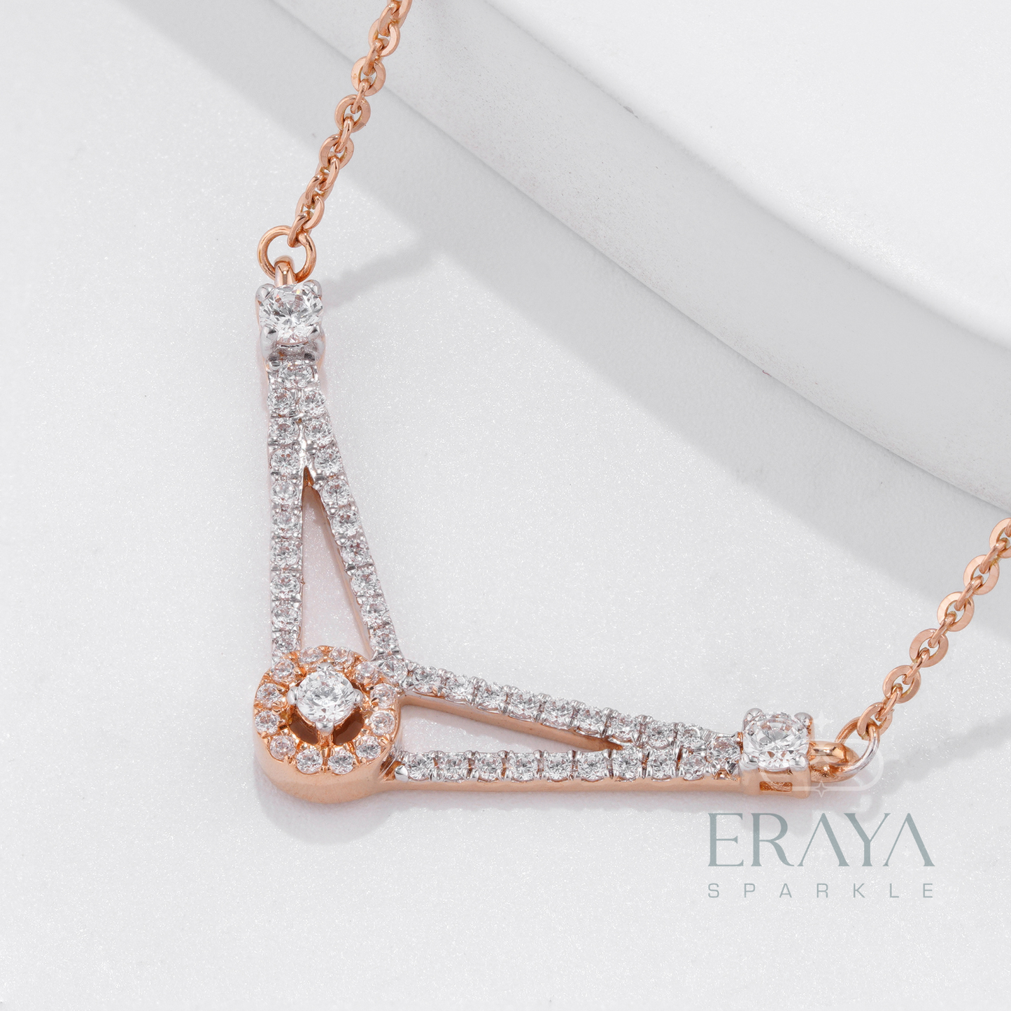 Close-up of V-shaped pendant showing 54 round diamonds – IGI GIA certified