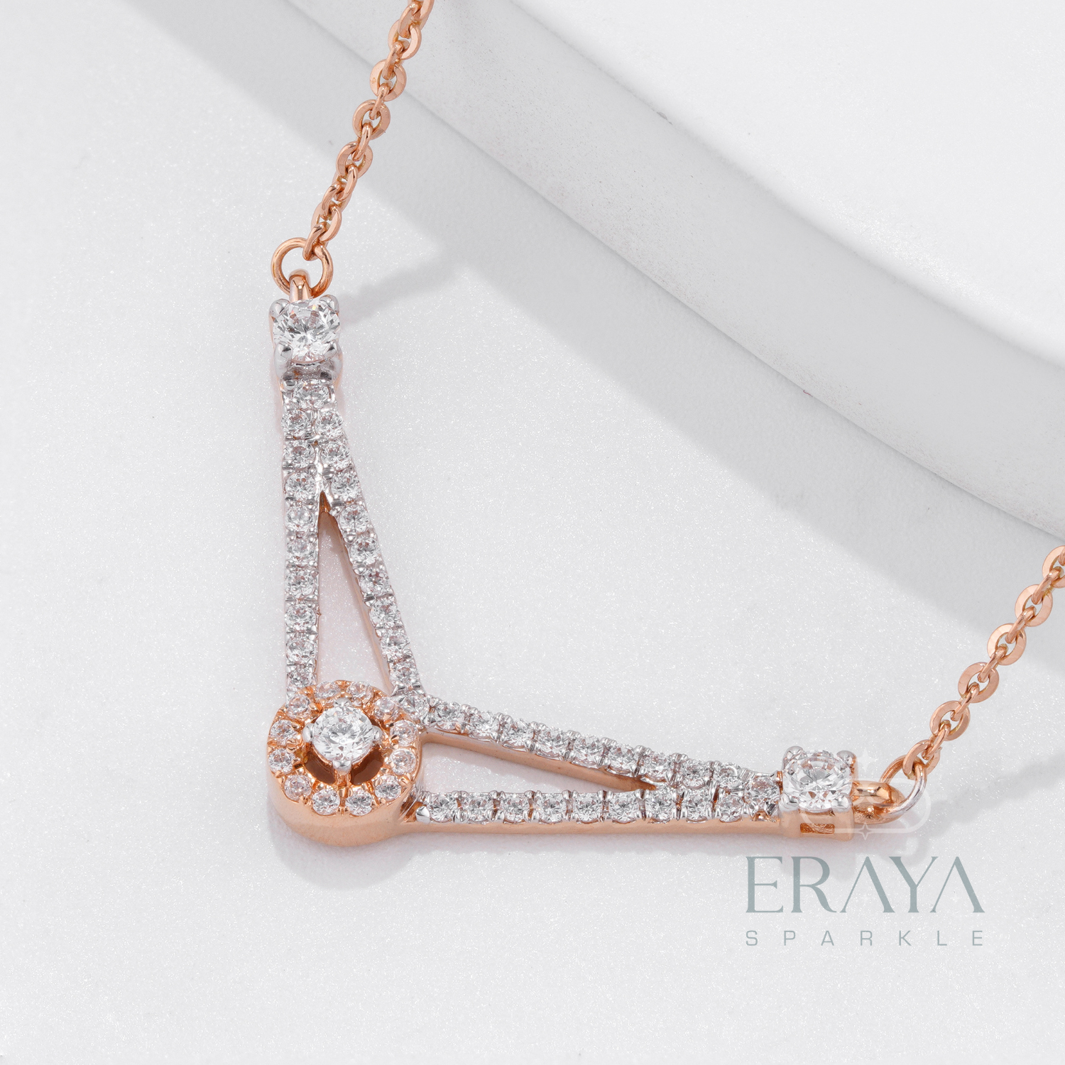 Close-up of V-shaped pendant showing 54 round diamonds – IGI GIA certified