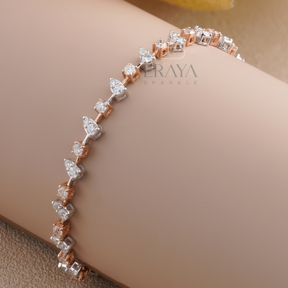 Close-up of pear-shaped settings with round lab grown diamonds