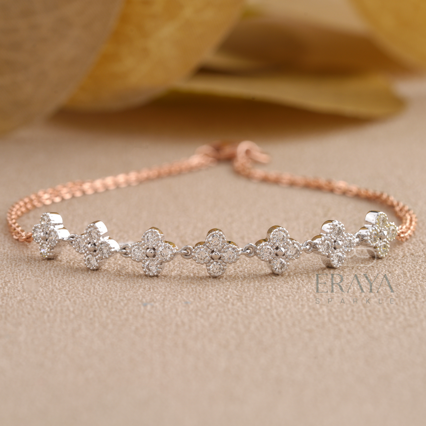 Close-up of lab grown diamonds floral cluster on rose gold bracelet