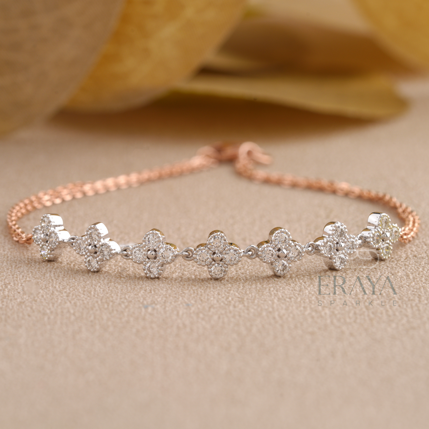 Close-up of lab grown diamonds floral cluster on rose gold bracelet