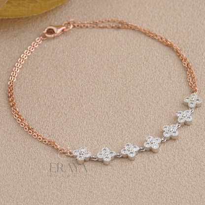 Close-up of lab grown diamonds floral cluster on rose gold bracelet