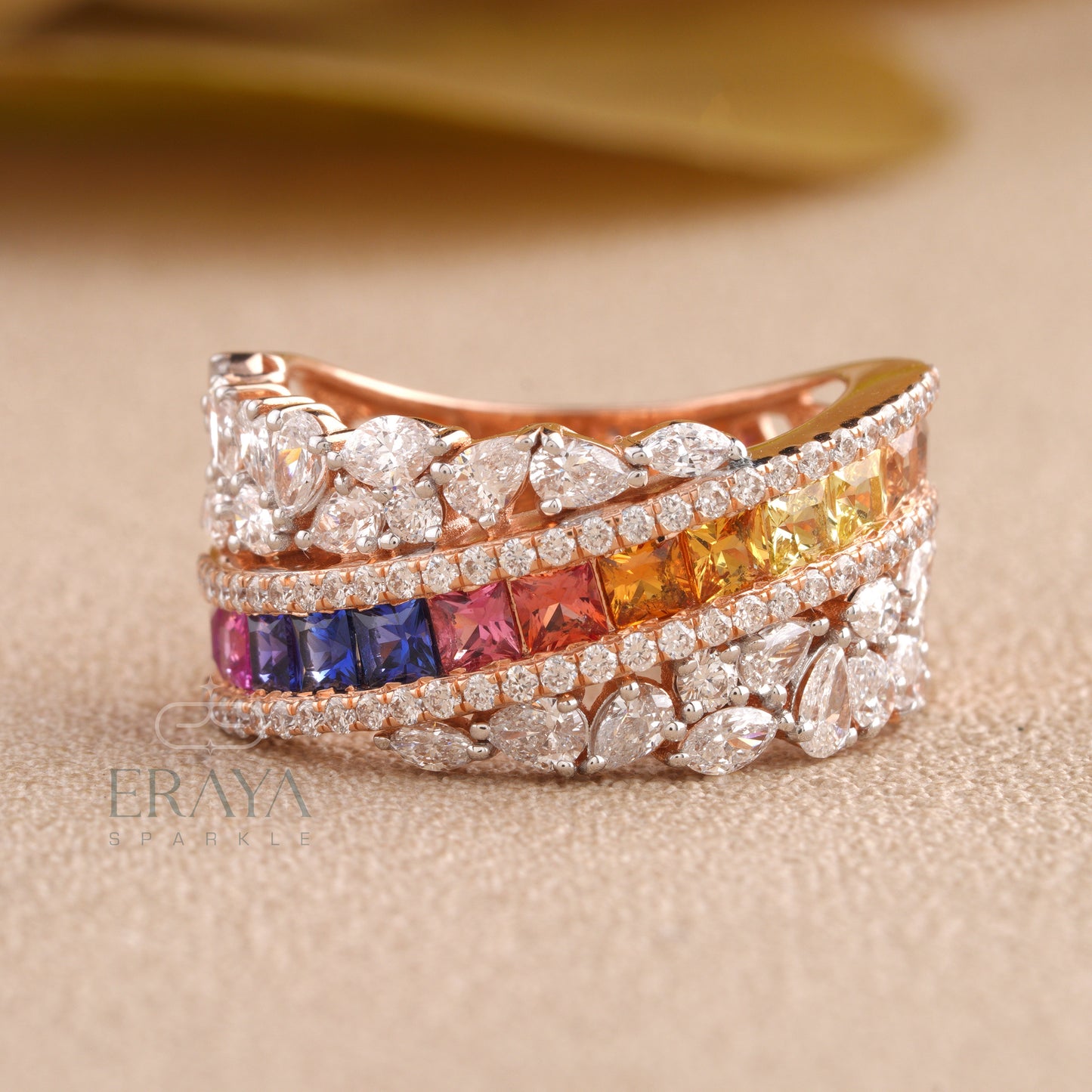 Close-up: princess-cut color stones and channel setting with lab-grown diamond accents