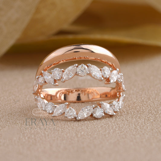 Side profile of leaf-shaped marquise diamond ring highlighting curved gold design.