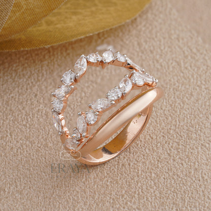 Top view of marquise diamond leaf ring showing leaf-inspired arrangement and gold band details.