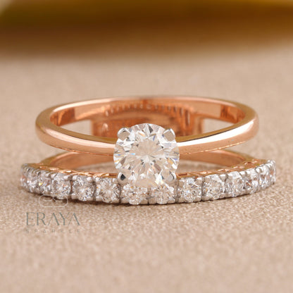 Front view of ERAYA gold solitaire ring highlighting round brilliant center diamond and pavé shoulders