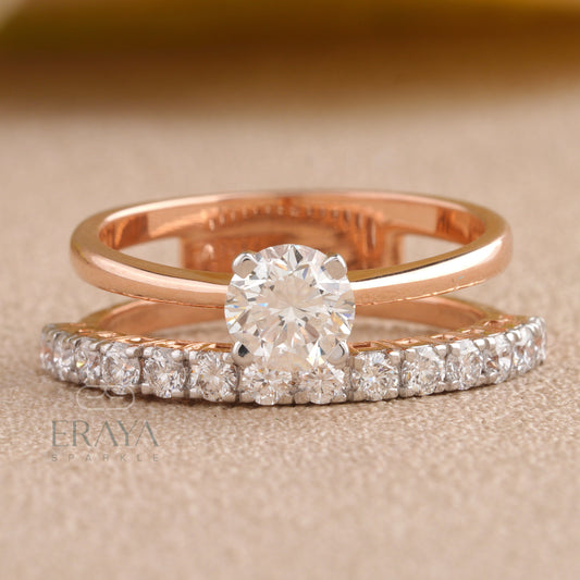 Front view of ERAYA gold solitaire ring highlighting round brilliant center diamond and pavé shoulders