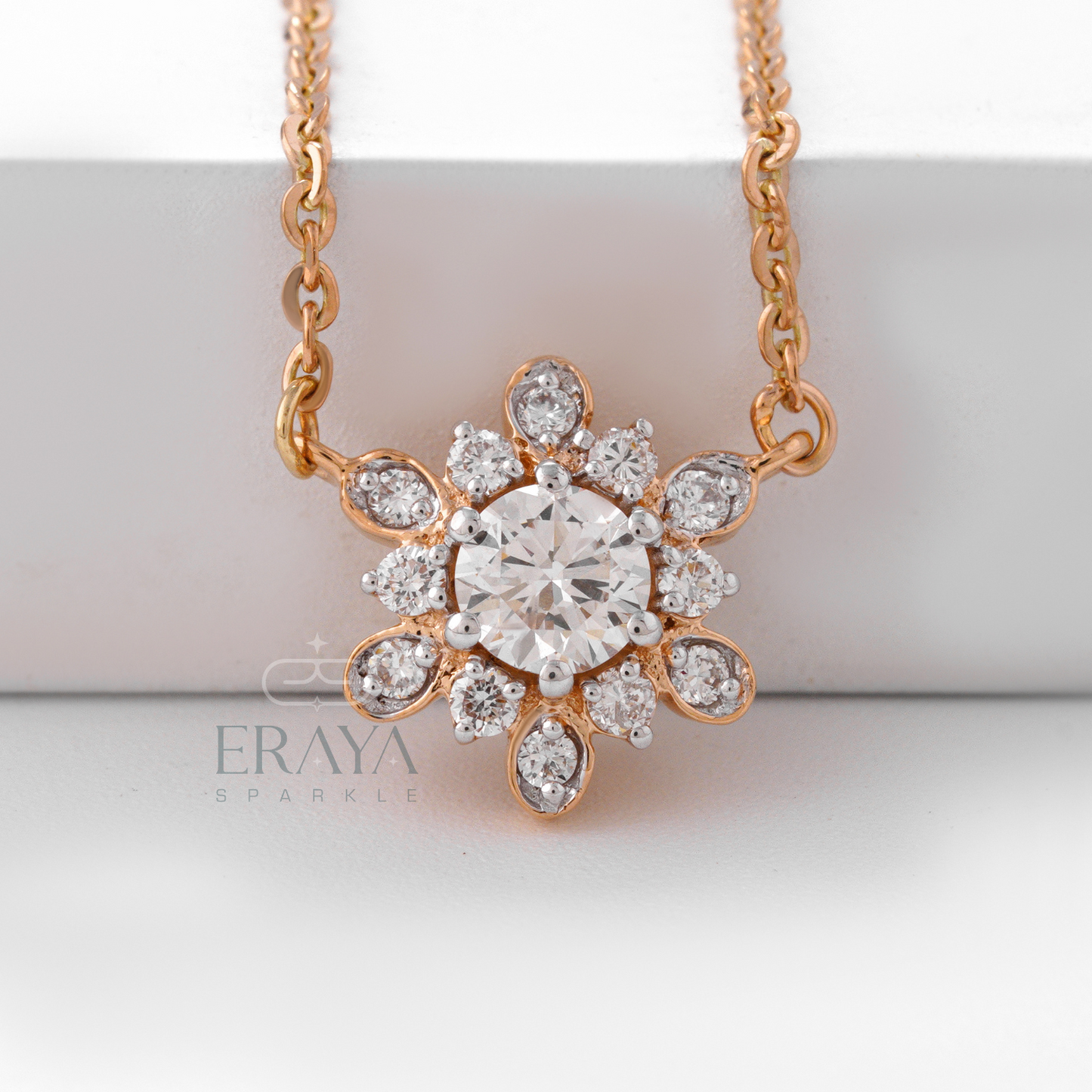 Gift-ready packaging with sunflower-inspired gold diamond pendant