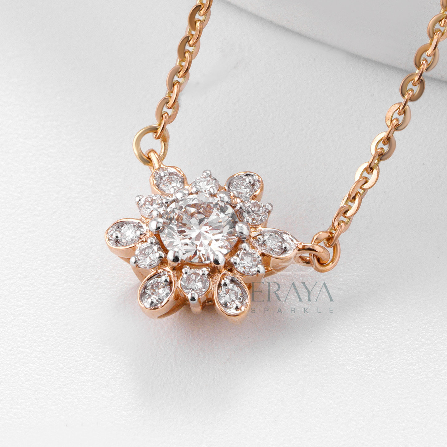 Close-up of floral diamond pendant featuring round and marquise-style stones – IGI GIA certified
