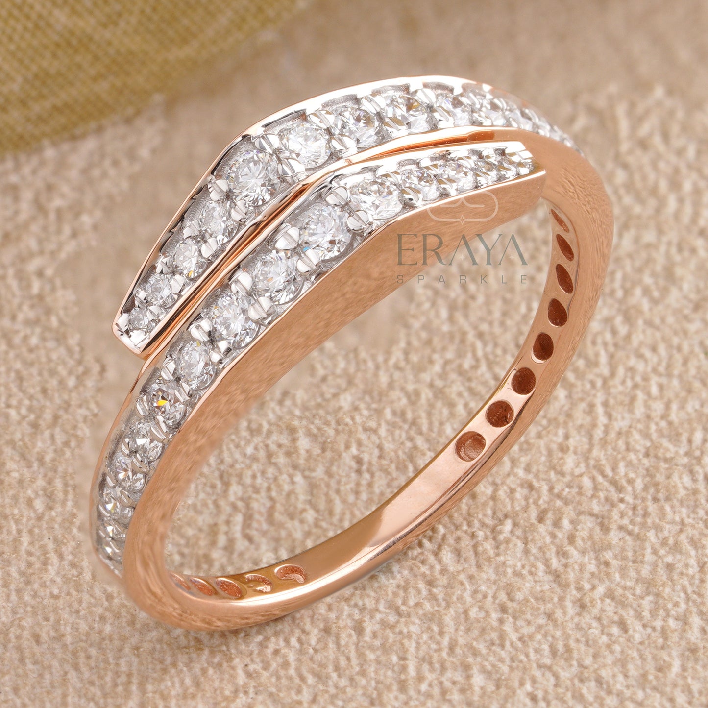 Top view of gold diamond wrap-around ring showing double-row diamonds