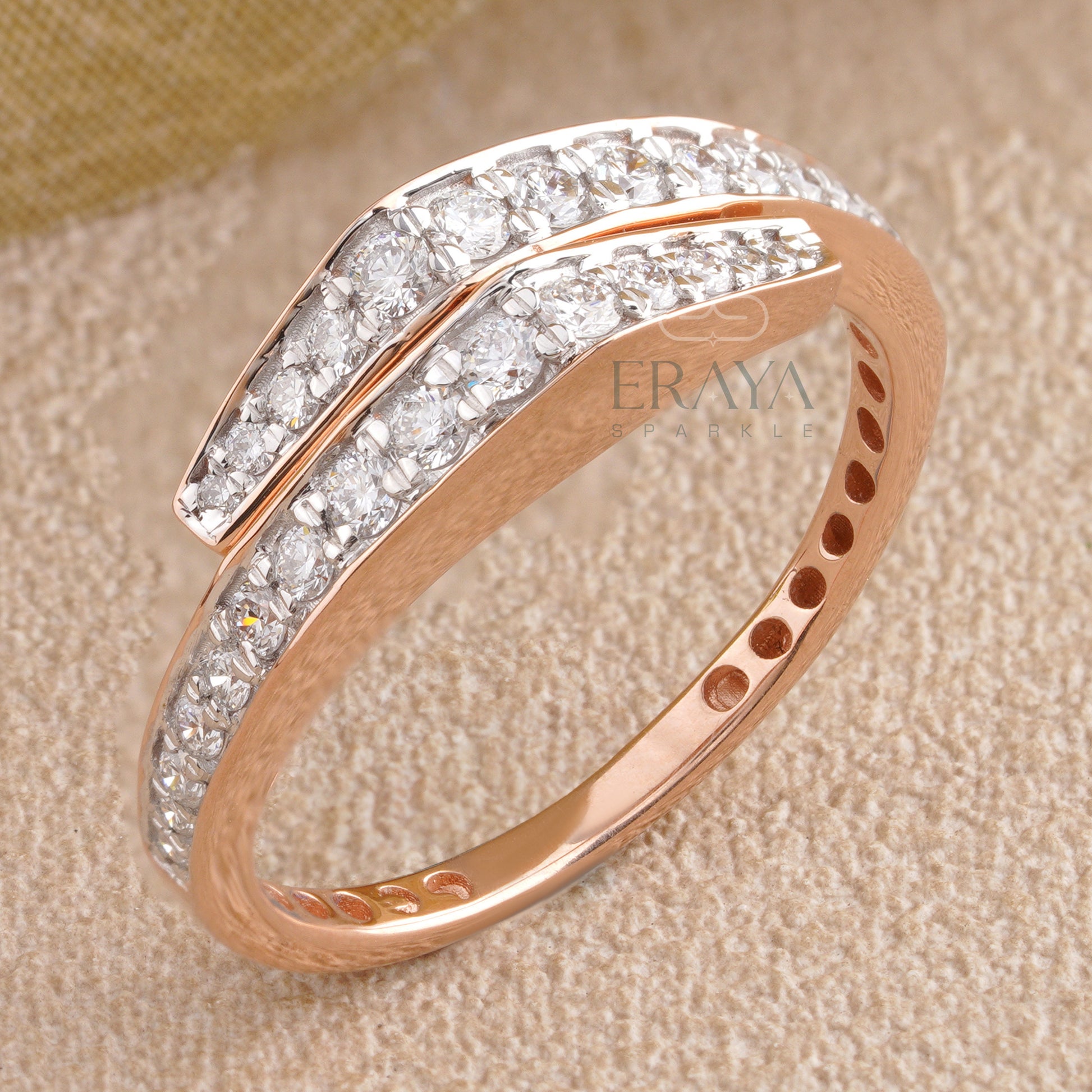 Top view of gold diamond wrap-around ring showing double-row diamonds