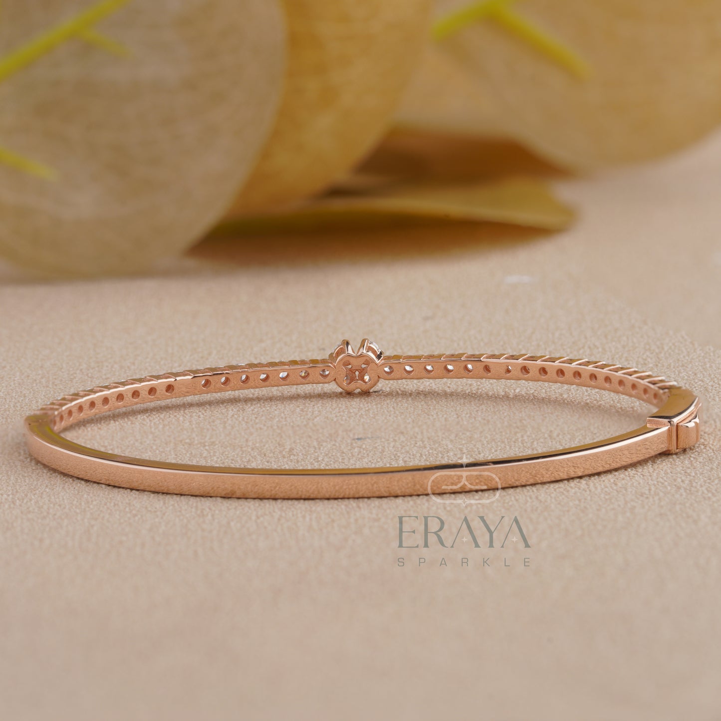 Dainty lab grown diamond bracelet in rose gold by Eraya on wrist