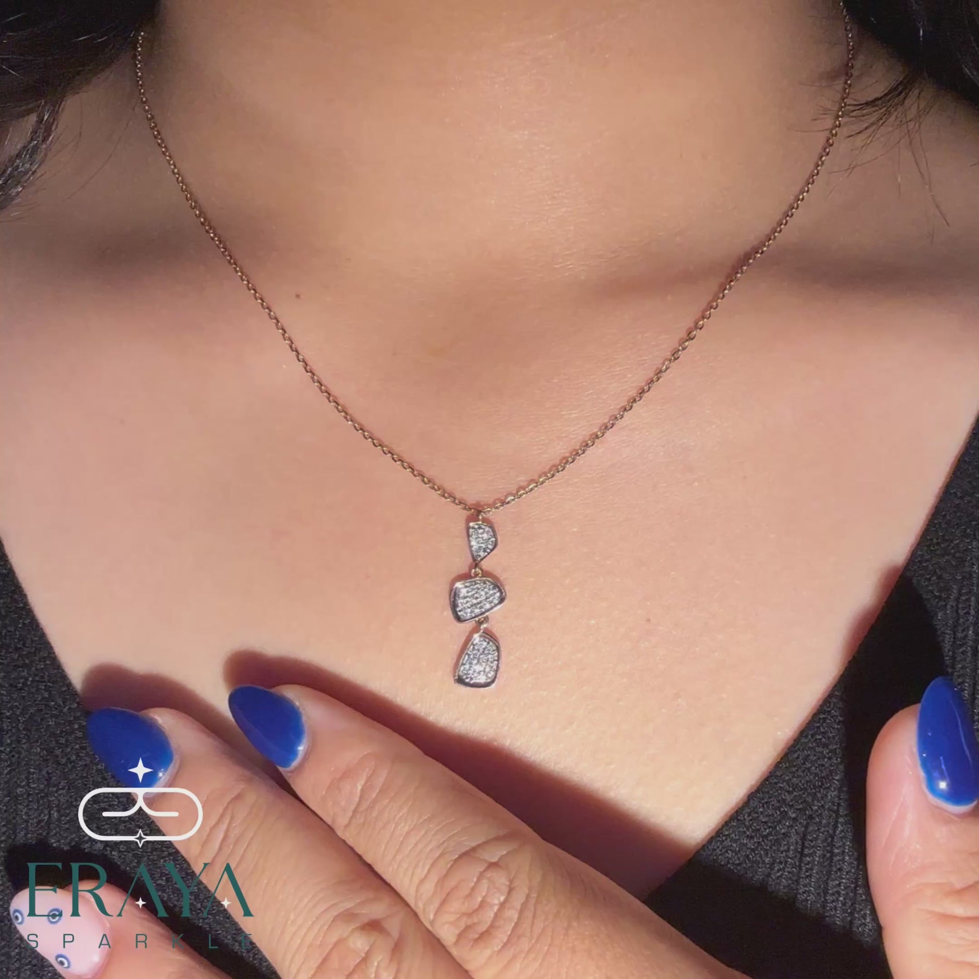 Model wearing lab grown diamond pendant and earring set