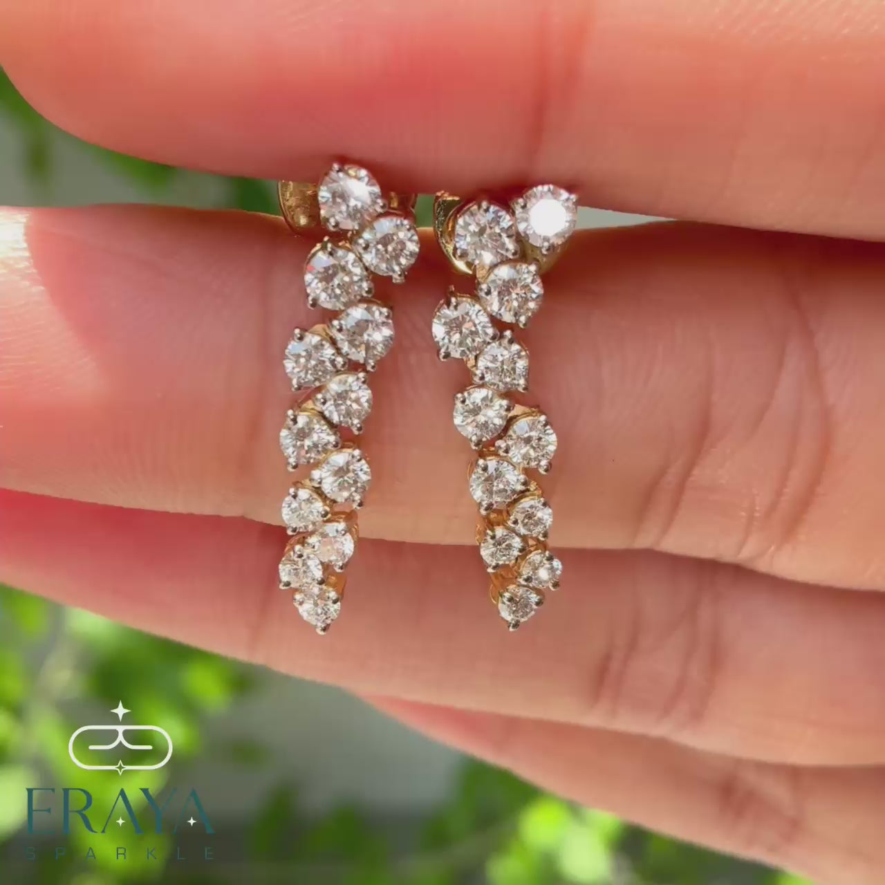 lab-grown-diamond-earrings-in-hand-all-side-views