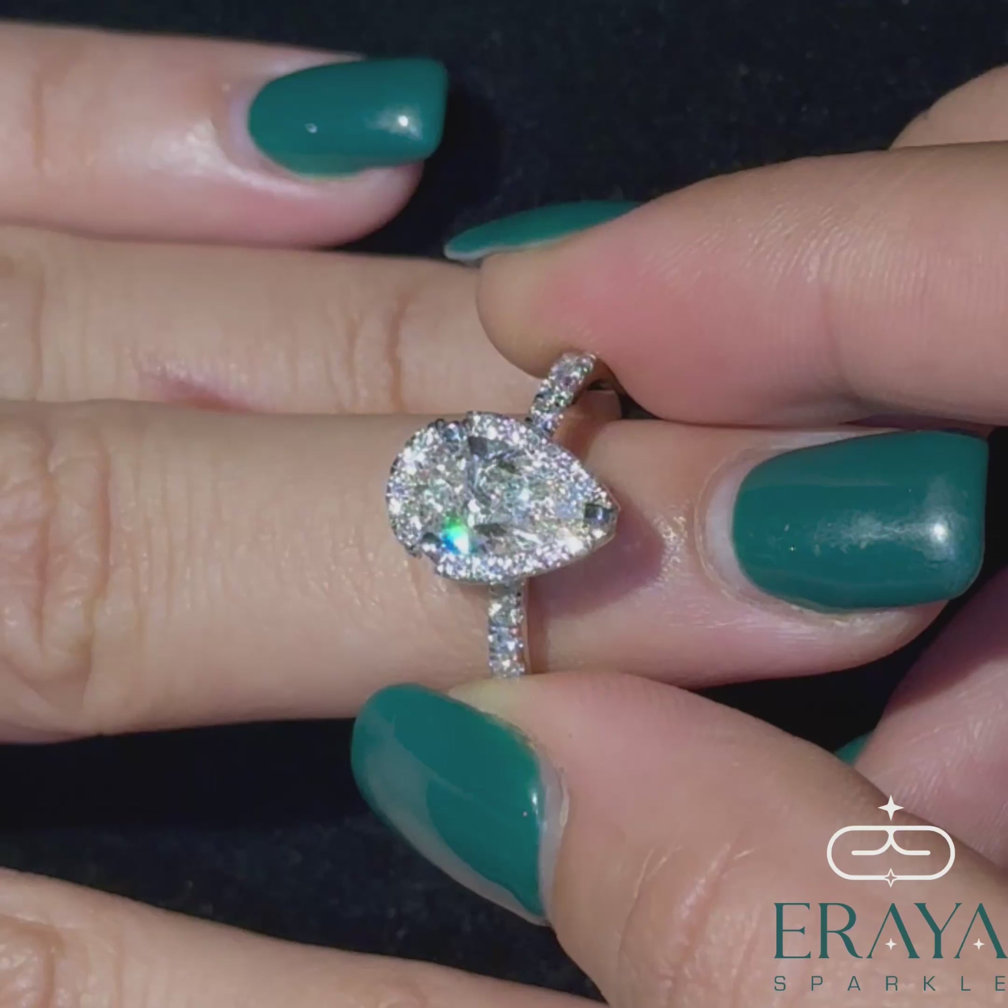 luxury bridal packaging with pear cut halo engagement ring